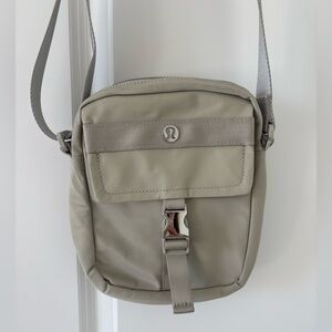 Lululemon Wunderlust Crossbody Bag in the color Raw Linen